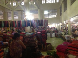 5-6 feet high stacks of gorgeous hand woven phaneks(Meitei sarong), shawls & Innaphis amongst other products! 